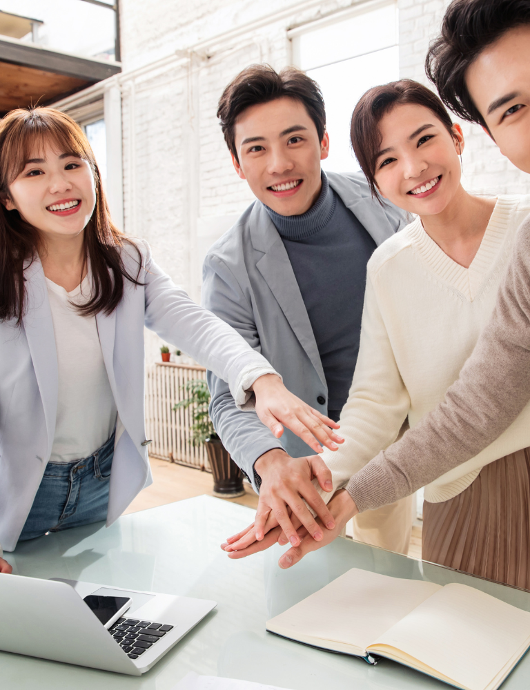 Success at HOIIY: Team and technical partners shaking hands after perfecting the thermal control design for the 8L Glass Air Fryer.