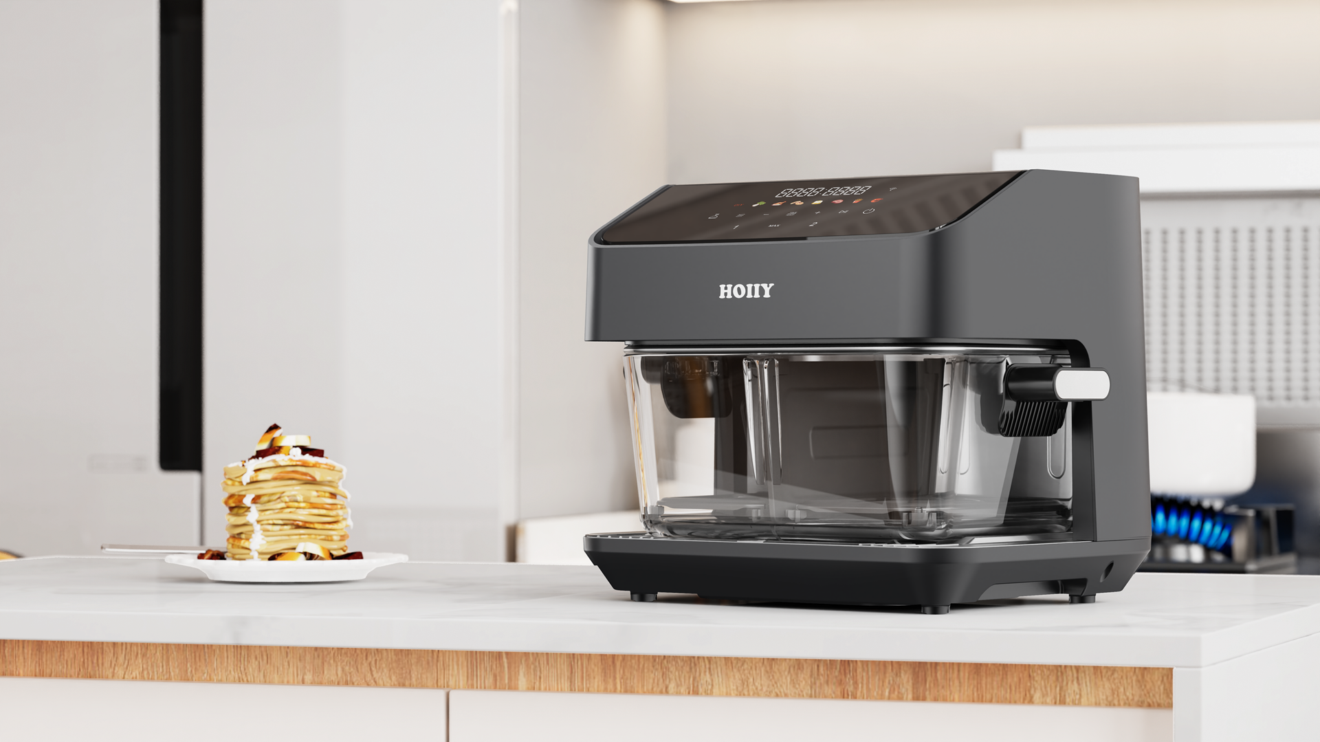 360° full-view cooking with HOIIY 8L Glass Air Fryer: Monitor your meals without heat loss or opening the lid. 8L Glass Air Fryer on a kitchen counter with pancakes in the background