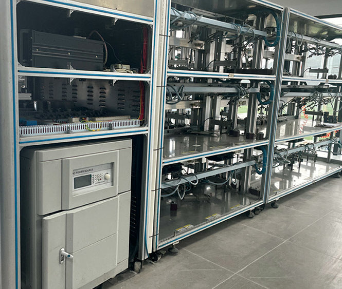 HOIIY China Life Test Lab: Industrial machinery performing 5,000+ cycle endurance tests on the 8L Glass Air Fryer to ensure long-term reliability.