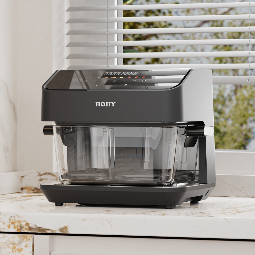 HOIIY 8L Glass Air Fryer with clear glass carafe on a marble surface, blurred window in the background